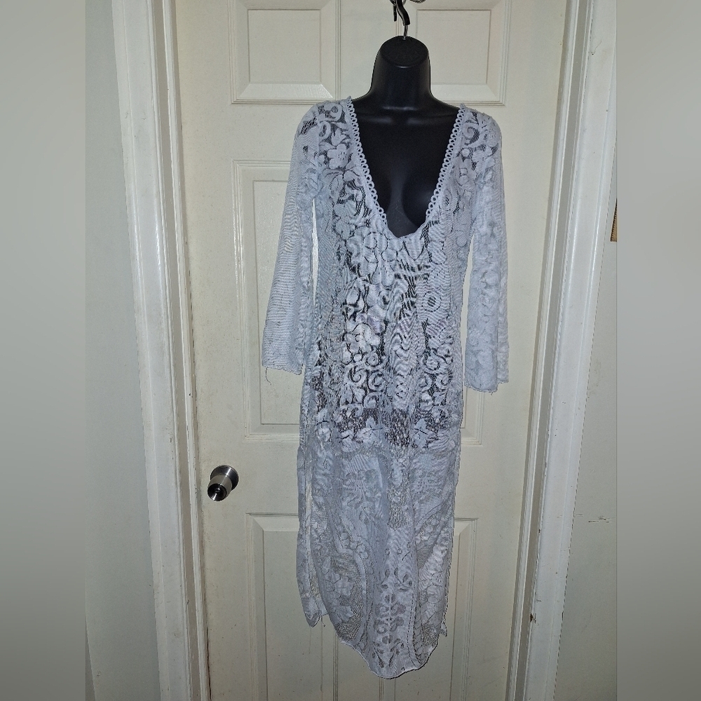 Lace beach cover up medium high side slits.